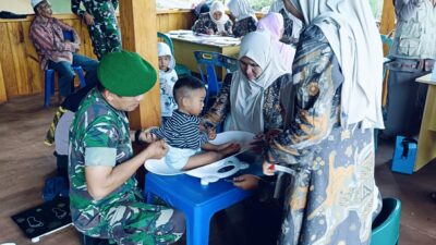 Satgas TMMD Aceh Tengah Bantu Petugas Kesehatan Jalankan Posyandu di Desa Binaan